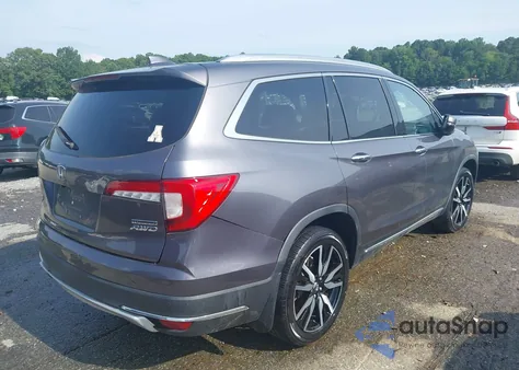 2020 Honda Pilot Awd Touring 7 Passenger z USA, uszkodzony, nr VIN 5FNYF6H67LB006686